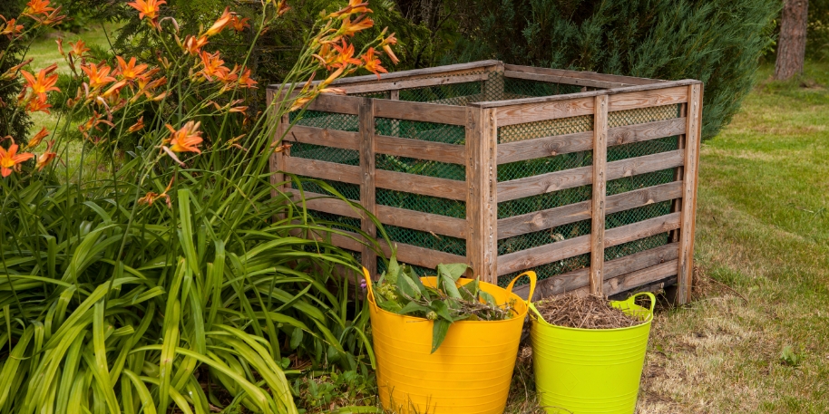compost bin a wooden blank compost bin in a residential backyard