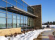 tinted office windows with snow outside