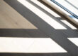 Flooring that is partially exposed to UV light.