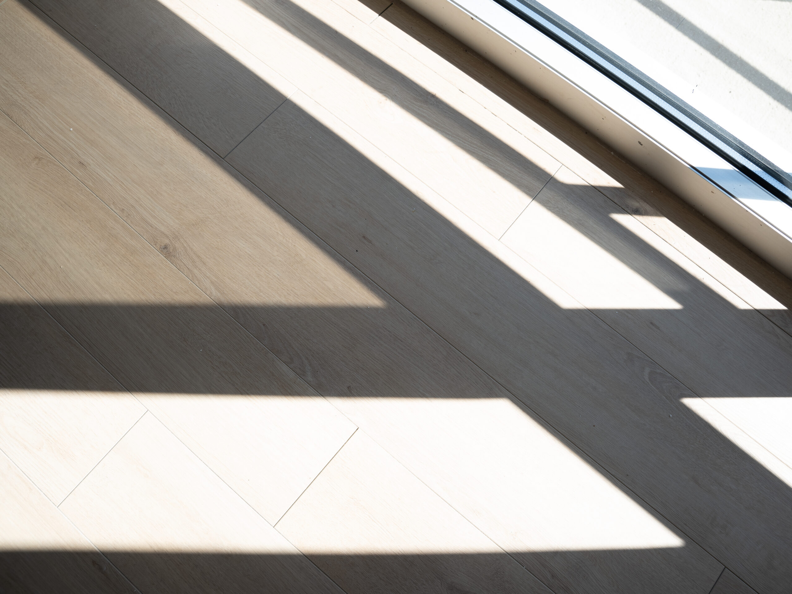 Flooring that is partially exposed to UV light.