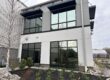 Exterior of a commercial building with professionally installed window tint by Energy Solutions Window Tinting, reducing glare and enhancing energy efficiency.