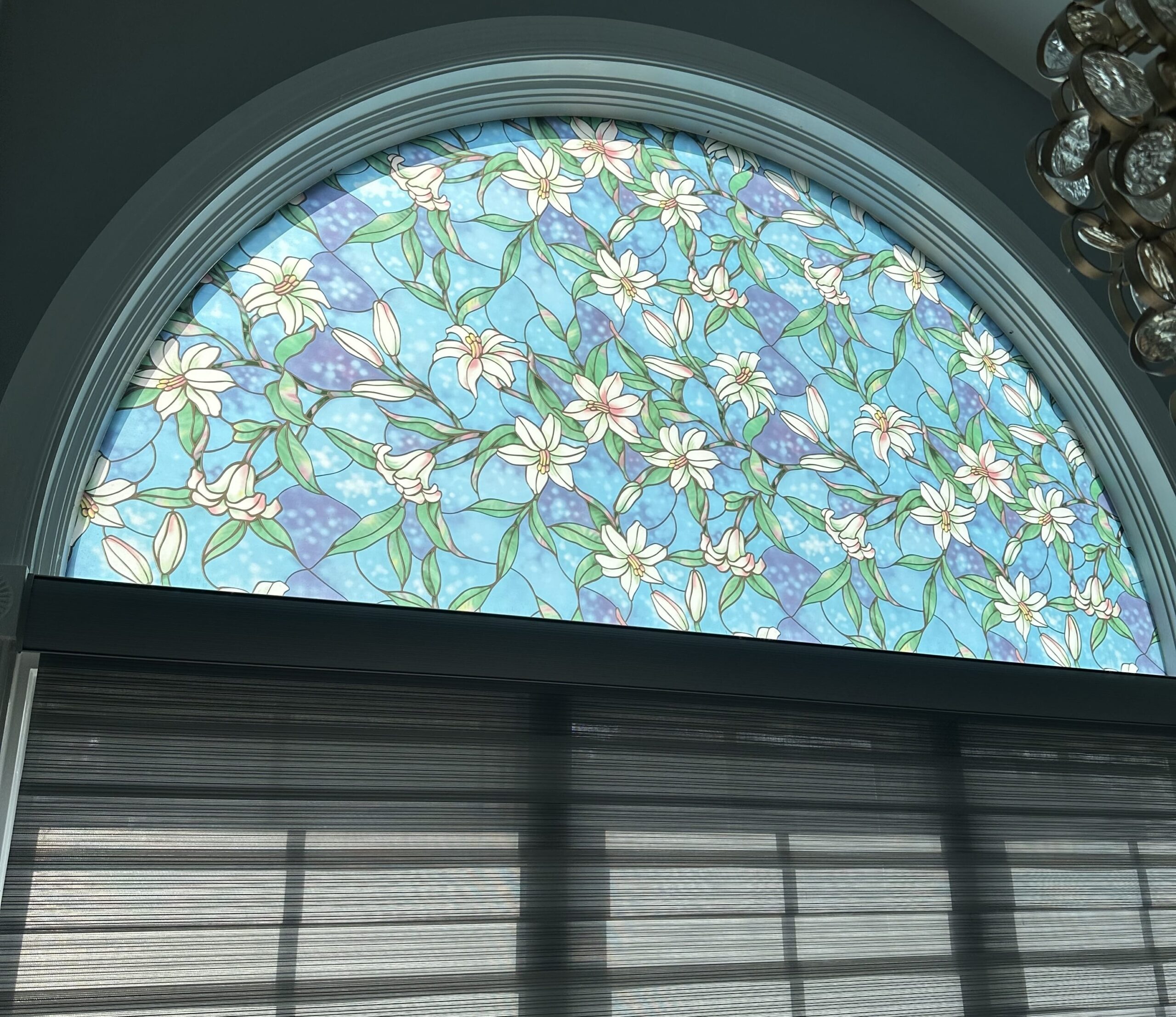 Decorative window film installed by Energy Solutions Window Tinting, adding style and privacy to the glass while enhancing the overall look of the space.
